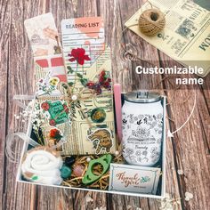 the contents of a craft kit are displayed in a box with twine and thread