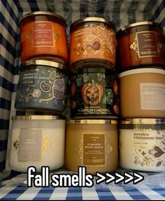 an open box filled with lots of different types of candles