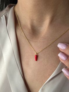 Spice up your style with our Red Chili Pepper Necklace 🌶️ Indulge in the irresistible charm of our Watermelon Necklace, crafted with high-quality elements to ensure lasting beauty ✨ Choose from 925K Sterling Silver, available in Gold, Rose Gold, or White Gold finishes. A timeless piece suitable for everyone, our Watermelon Necklace adds a touch of elegance to any ensemble 💙 Details: * Crafted from 925K Sterling Silver, plated with 14K Gold, Rose Gold, or White Gold * Chain length approximately Red 14k Gold Jewelry For Valentine's Day, Red 14k Gold Necklace For Valentine's Day, Dainty Red 14k Gold Necklace, Red Tarnish-resistant Pendant Jewelry, Red Sterling Silver Dainty Jewelry, Red Pendant Gold-plated Jewelry, 14k Gold Red Jewelry Tarnish Resistant, 14k Gold Red Tarnish-resistant Jewelry, Red Dainty Sterling Silver Jewelry