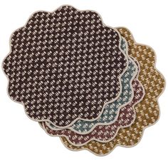 three placemats with different patterns on each one and the same pattern on the other