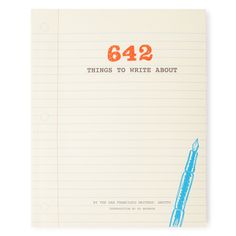 a notepad with a blue pen on it and the words 642 things to write about