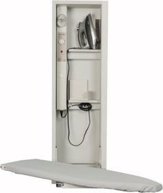 an ironing board is attached to the back of a cabinet with its door open