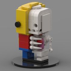 a lego toy is made to look like it's holding onto the back end of a