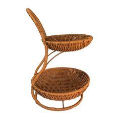 two wicker baskets stacked on top of each other in the shape of a chair