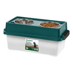 a green and white container with two bowls filled with food on the top, one bowl has a dog's meal in it