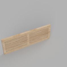 a close up of a wooden object on a gray background with room for text or image