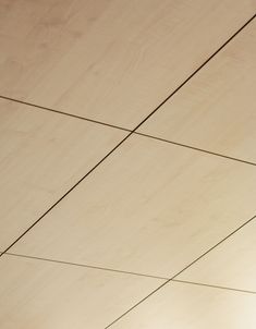 the underside of a wooden ceiling with electrical wires