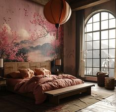 a bedroom with a large window and a bed in front of a painting on the wall