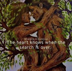 two people hugging each other in front of a tree with the words, the heart knows when the search is over