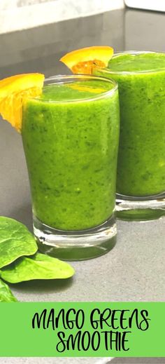 two glasses filled with green smoothie on top of a counter