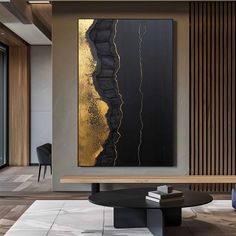 an abstract painting hangs on the wall next to a coffee table in a modern living room