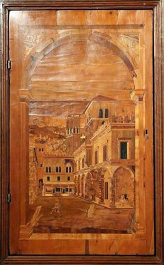 an old painting is on display in a wooden frame, with the image of a city