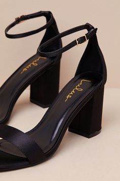 You're certain to step up your style essentials when you add the Lulus Arylee Black Satin Ankle Strap Heels to your closet! Sleek woven satin shapes a single toe strap, an almond-shaped toe bed, and a wrapped block heel. A dainty ankle strap rises from the sturdy heel cup and secures with a gold buckle. 3" Wrapped Block Heel. Cushioned Insole. Felted Rubber Sole Has Nonskid Markings. Man Made Materials. Imported. Lulus | Arylee Black Satin Ankle Strap Heels | Size 6. Black Block Heel Sandals, Style Essentials, Almond Shaped, Size 11 Heels, Black Sandals Heels, Ankle Strap Heels, Block Heels Sandal, Fashion Essentials, Ankle Strap Sandals