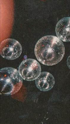 several disco balls sitting on top of a table