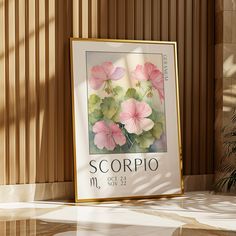 there is a poster on the wall with pink flowers in it that says scorppo