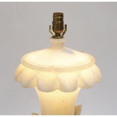 an old fashioned lamp is turned on and off