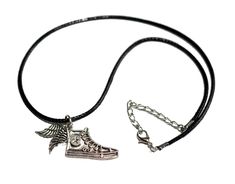 PRICES MAY VARY. Unique Hermes Winged Shoe Design: Show your Percy Jackson fandom with this intricately crafted necklace. High-Quality Craftsmanship: Made to last, this necklace boasts fine detailing and durable materials. Perfect Gift Choice: Ideal for fans, it's packaged for gifting, making it a great present for any occasion. Fandom Pride: Wear it proudly to display your love for Percy Jackson's epic adventures. Versatile Fashion Statement: A trendy accessory that complements various styles f Winged Shoes, Percy Jackson Necklace, Hermes Necklace, Pride Wear, Wing Shoes, Thread Bracelets, Shoe Design, Percy Jackson Fandom, Trendy Accessories