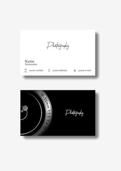 two black and white business cards with the word photography on them, one has a camera