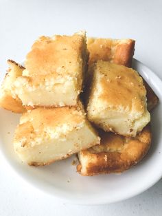 several pieces of bread on a white plate