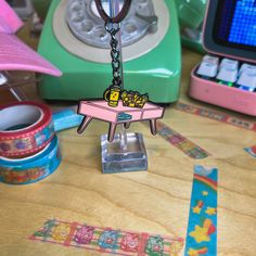 a keychain that is sitting on top of a table