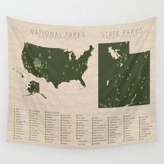 a map of the national parks on a wall hanging in a room with white walls