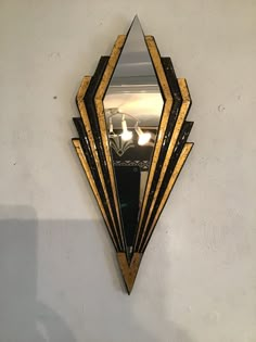 a mirror mounted to the side of a wall