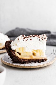 a piece of banana cream pie on a plate