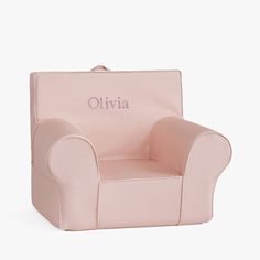 a pink children's personalized chair with the word, livvia on it