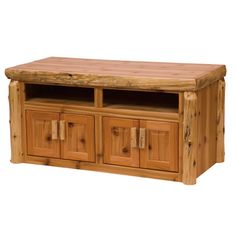 a large wooden entertainment center with drawers