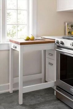 a kitchen with an oven, counter and sink