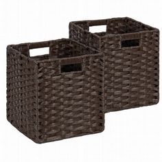 two brown baskets sitting next to each other