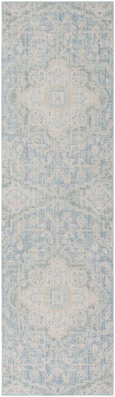 a blue and white rug with an intricate design