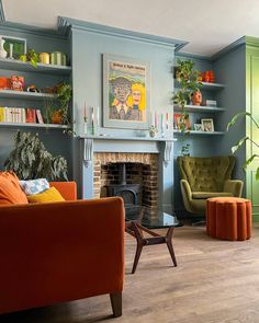 a living room filled with furniture and a fire place