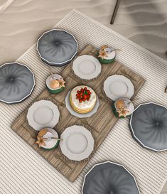 a table topped with plates covered in frosting