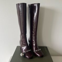 Originally Bought From Nordstrom, Unfortunately They Are Just A Bit Too Tiny On Me. Never Worn! Only Tried On. Ball On Chain Of Right Boot. Color Is Sort Of A Dark Wine. Love These And Wish I Didn’t Have To Sell Them. Tags: Longchamp, Gucci, Reformation, Vagabond, Steve Madden, Ralph Lauren, Versace, Dolce Vita Formal Boots With Chain And Round Toe, Longchamp Rain Boots, Longchamp Charms, Vintage Brown Wide Calf Boots, Longchamp Red, Longchamp Leather, Classic Brown Knee-high Moto Boots, Luxury Brown Snip Toe Knee-high Boots, Taupe Heels