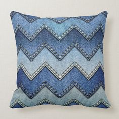 a blue and white chevroned pillow with the words denim jeans patchwork pattern printed on it