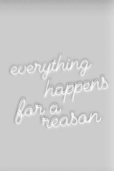 the words everything happens for a reason are written in white on a gray background,