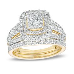 For every beautiful moment, choose this cushion-shaped multi-diamond bridal set in 10K gold to make the memory last. Created in warm 10K gold The engagement ring showcases a double frame of diamonds surrounding the center cushion-shaped diamond composite. The curved wave ribbons of the split multi-row shank glisten with diamonds. Seal your vows with the contoured diamond-lined wedding band. This bridal set dazzles with 1-1/8 cts. t.w. of diamonds. Gold Cushion Cut Diamond Wedding Ring, Cushion Cut Diamond Ring With Diamond Accents For Wedding, Cushion Cut Diamond Ring With Accents For Wedding, White Cushion Cut Diamond Ring For Wedding, Cushion Cut Wedding Diamond Ring With Accents, Yellow Gold Diamond Bridal Sets For Wedding, Gold Bridal Sets With Diamond Accents, Princess Cut Pave Setting Jewelry For Wedding, Diamond Bridal Sets With Diamond Accents For Marriage