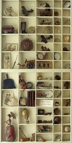 a book shelf filled with lots of different types of clocks and knick knacks