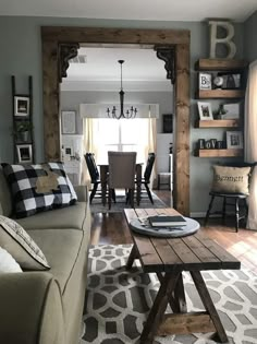 a living room filled with furniture and decor