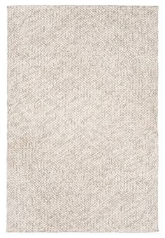 an area rug with white and beige colors on the floor, it is made out of wool