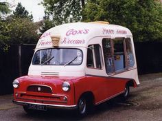 an old red and white ice cream truck