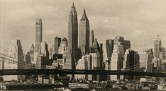 an old black and white photo of the brooklyn bridge