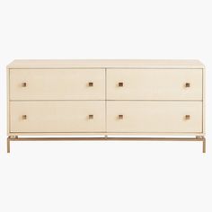 a large white dresser with four drawers