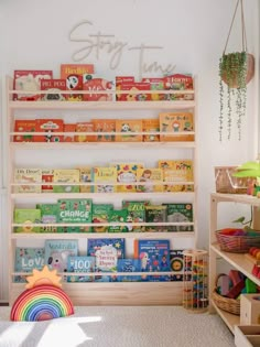 a child's room with bookshelves and toys on the shelves in front of it