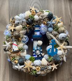 a wreath made out of seashells and other items