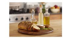 bread and olive oil on a wooden cutting board