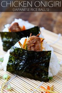 chicken and spicy mayo sushi on rice with chopsticks