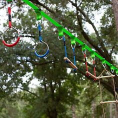 there are many different colored objects hanging from the trees