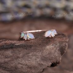 Antique Marquise Cut Opal Wedding Ring Dainty Rainbow Opal Bridal Stacking Matching Band Vinatge Rose Gold Opal Cluster Open Ring RING INFOEMATION ★ Open Wedding Band ⊹Stones - Natural Opal Cut - Marquise & Round shaped ⊹Band width - 1.5mm ⊹Metal - 14k or 18k solid gold (available in yellow, white or rose gold) ⊹Ring size - any sizes (size above 9 will be priced individually) ★Enter my shop: www.etsy.com/shop/ArcadiastudioUS MAKING & SHIPPING ★ Shipping ⊹It usually takes 2-3 weeks for production Round Opal Ring, Diamond And Opal Ring, Antique Opal Ring, Opal Wedding Ring Set, Opal Engagement Ring Rose Gold, Unique Opal Ring, Open Wedding Band, Opal Band Ring, Opal Wedding Ring